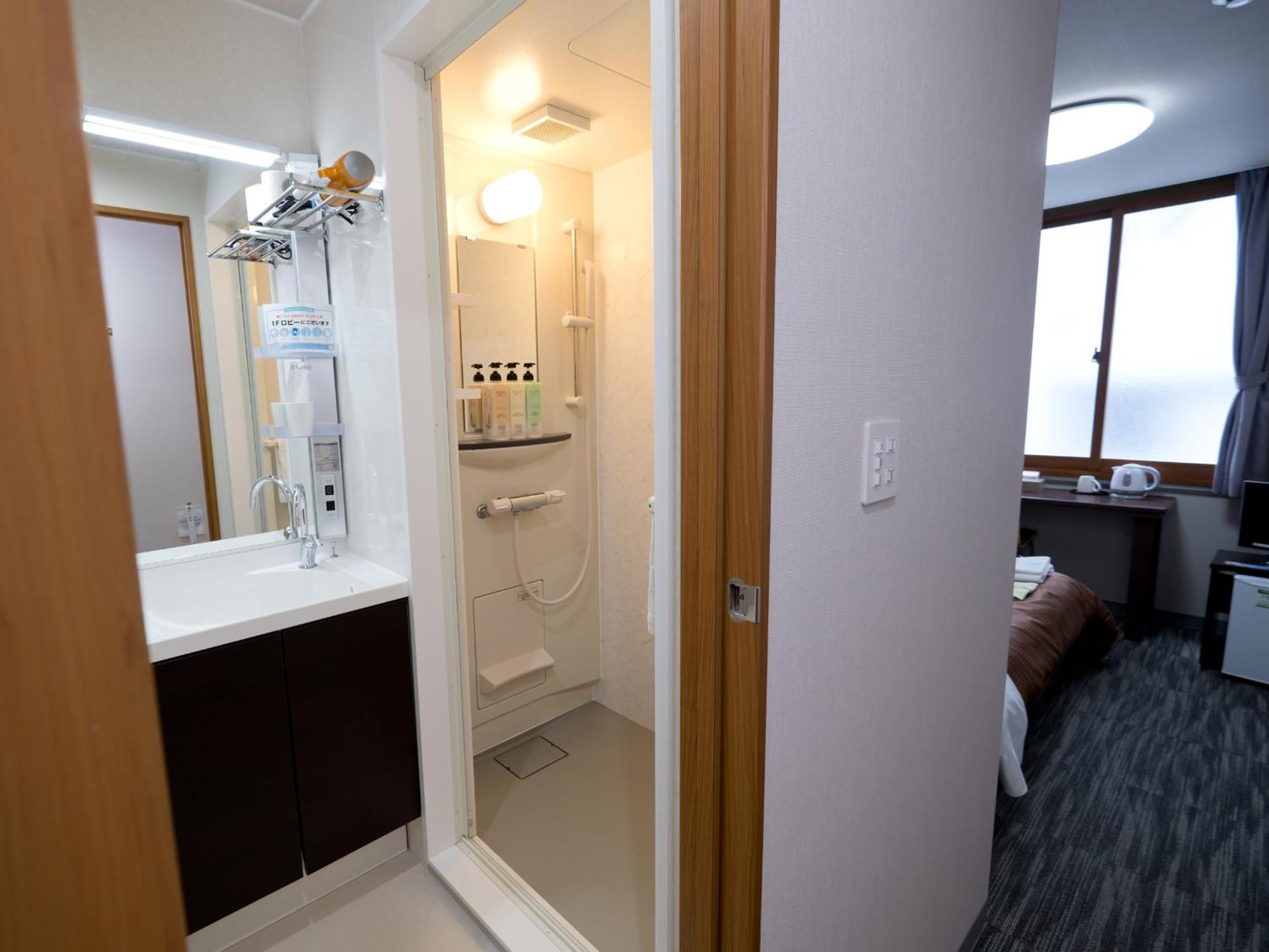 Matsuyama New Grand Hotel Rum bild